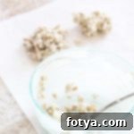 Σπιτικές Μπάρες Πρωτεΐνης Μήλου Μάτσα: Φυτικές και Χωρίς Ξηρούς Καρπούς 9 Πρωτεϊνικές μπάρες μήλου και μάτσα και κομμάτια λιωμένης σοκολάτας με σπόρους