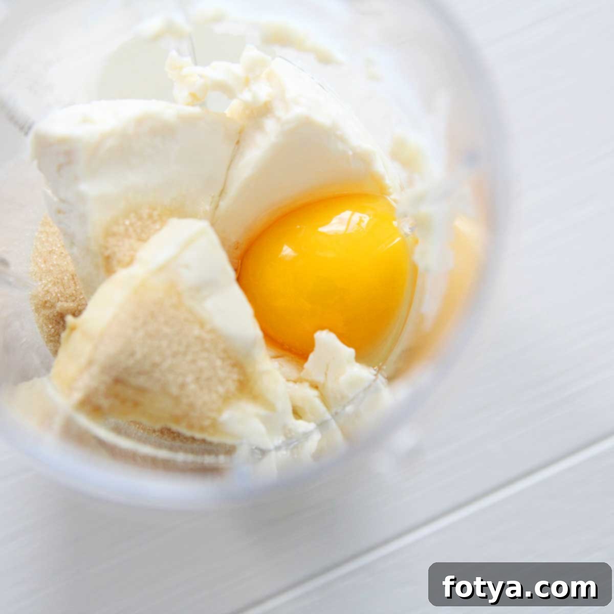 Πώς φτιάχνουμε εύκολη γέμιση cheesecake για Mooncakes και Mochi με μόλις 3 υλικά 2 Ανακατέψτε τυρί κρέμα, αυγό και ζάχαρη