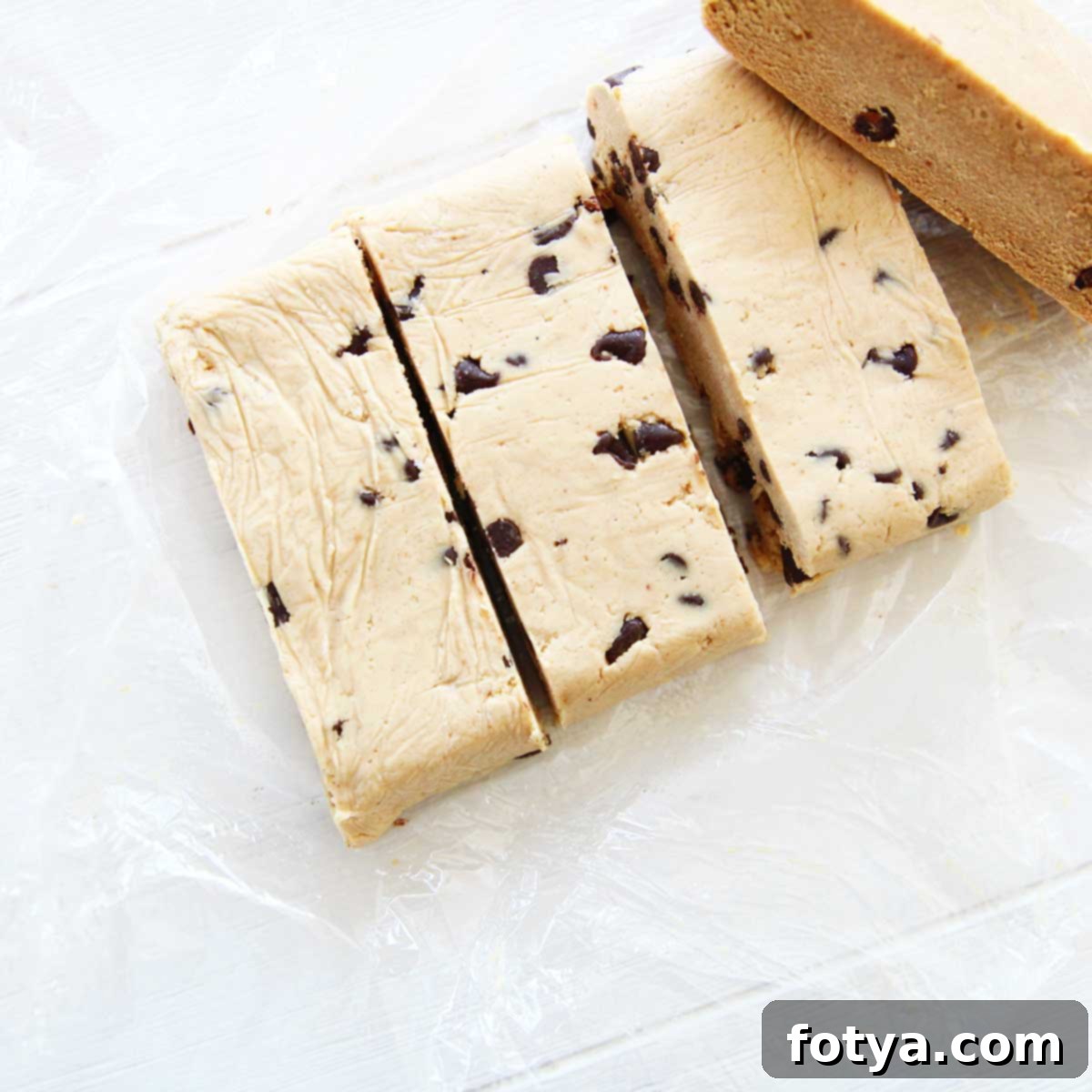 Συνταγή για Μπάρες Πρωτεΐνης PB Fit με Ελληνικό Γιαούρτι 4 Συστατικά 8 Κόψτε τη ζύμη σε μπάρες πρωτεΐνης