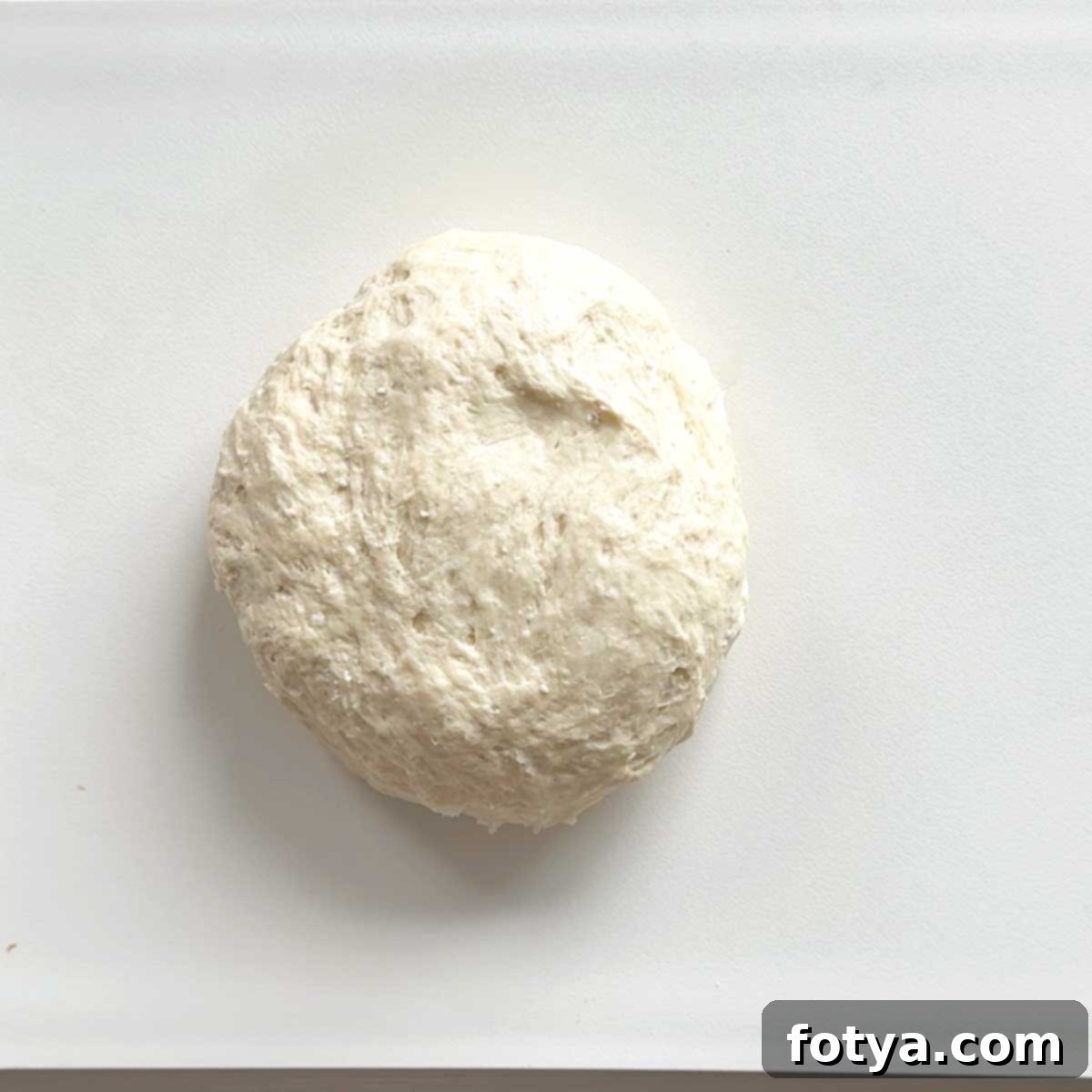 Πανεύκολη Πρωτεϊνούχα Πίτα Ναν με Cottage Cheese και 5 Μόνο Υλικά 7 Ξύσιμο της φουσκωμένης ζύμης