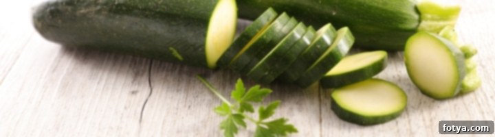 Διατηρήστε φρέσκα φρούτα και λαχανικά 9 Κολοκυθάκια σε ξύλινη επιφάνεια